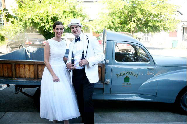 Bride and Groom infront of barn diva truck