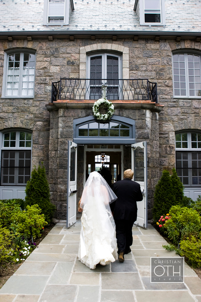 Bride and groom walk into stone reception hall, Wainright House wedding venue, Rye New York, Lyndsey Hamilton Events, Christian Oth Studio 090711FULMEG0104