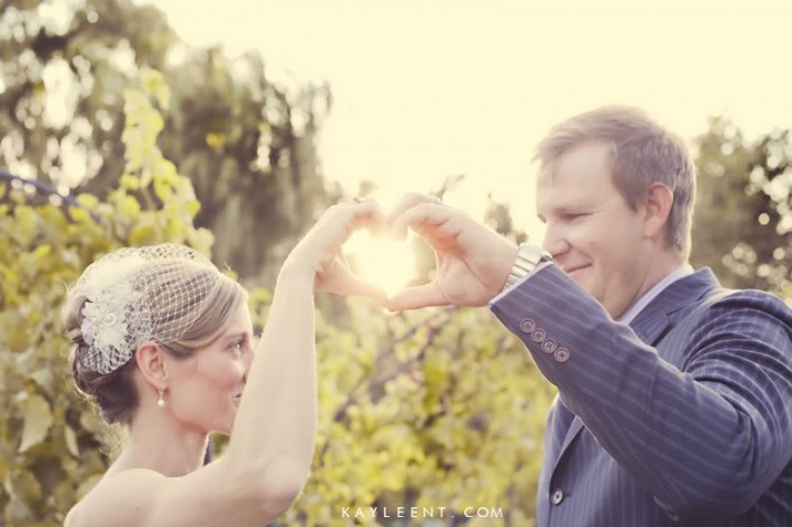 Bride and groom pose in vineyard, La Caille wedding venue, Salt Lake City Utah wedding, Kayleen T photography, ruby red slippers 20090906-IMG_8249-Edit