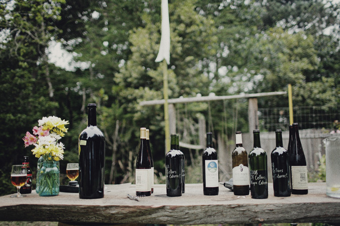 rustic backyard rehearsal dinner, personalized wedding wine, wine table inspiration, mason jar decor, wildflower inspiration, outdoor rehearsal dinner