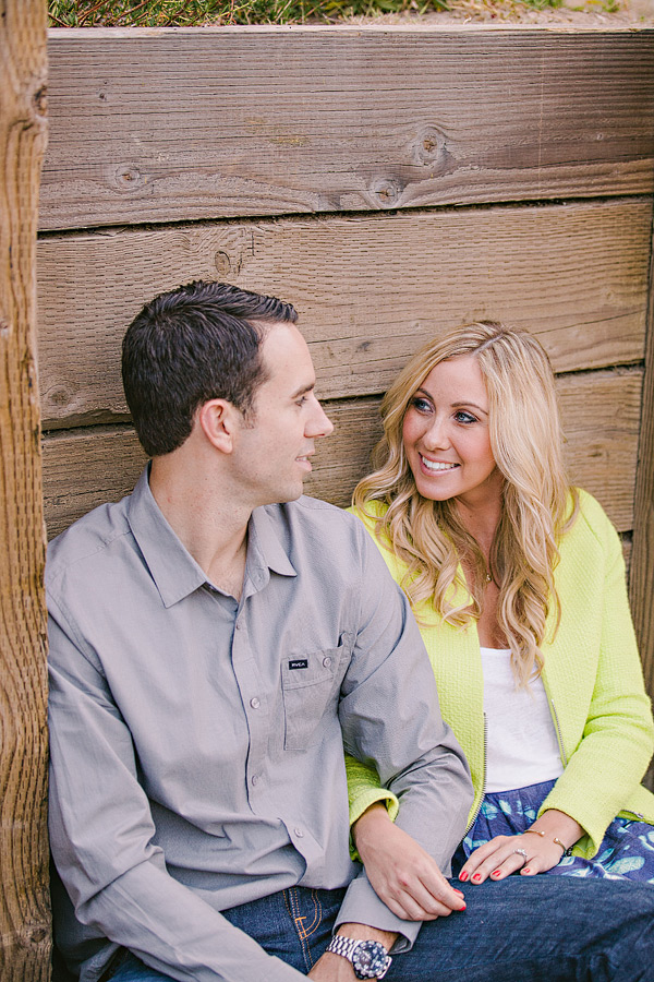 Laguna Beach engagement session, Crystal Cove, neon blazer, beach, sand, coral dress, sunlight, field