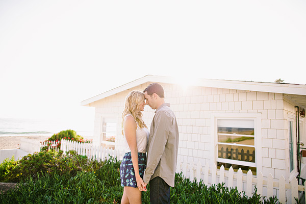 Laguna Beach engagement session, Crystal Cove, neon blazer, beach, sand, coral dress, sunlight, field