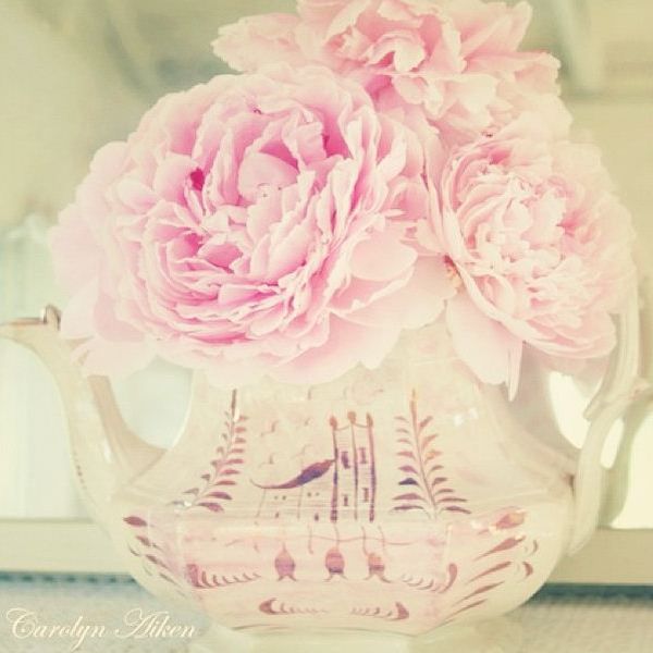 pink peonies in a hand-painted teapot