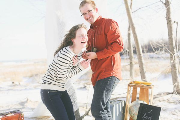 Travel inspired winter surprise proposal 19