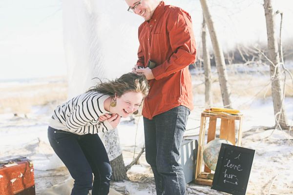 Travel inspired winter surprise proposal 20