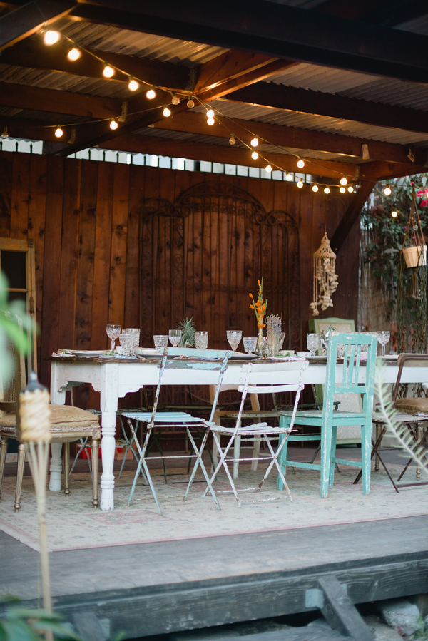 Sustainable dinner party inspiration, hunt and gather, backyard dinner party, cafe lights, mix and match chairs, vintage glassware __Brandi_Welles_Photographer_20121030huntandgather00084PRINT_low