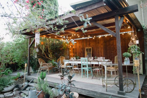 Sustainable dinner party inspiration, hunt and gather, backyard dinner party, cafe lights, mix and match chairs, vintage glassware __Brandi_Welles_Photographer_20121030huntandgather00091PRINT_low