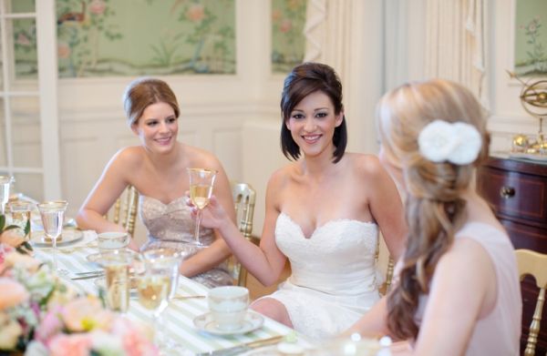 Citrus Bridal Shower, bride, green striped tablecloth, floral table runner