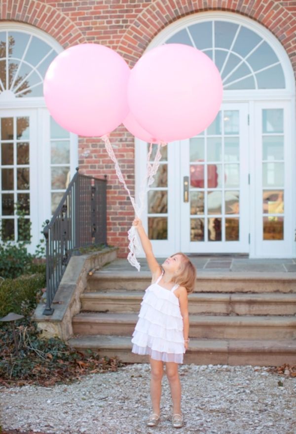 Citrus Bridal Shower, giant pink balloons, lace string, brick, ruffled dress