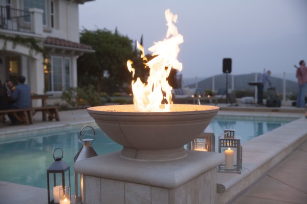 texan going away party, fire, pool, candles, outdoor, lanterns