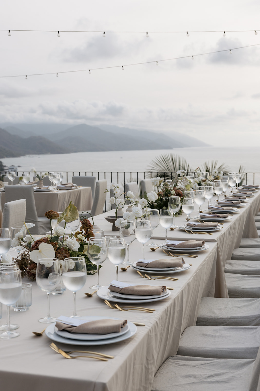 An Intimate Oceanfront Wedding in Puerto Vallarta with Coastal Elegance & Sculptural Florals